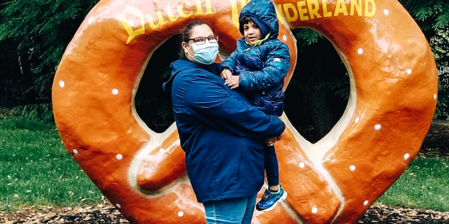 Me and my son in front of Dutch Wonderland Pretzel Statue