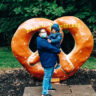 Me and my son in front of Dutch Wonderland Pretzel Statue