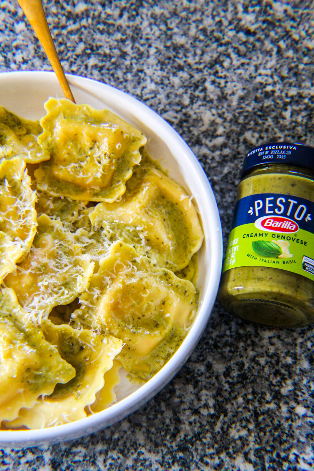 Barilla Creamy Genovese Pesto next to loster ravioli