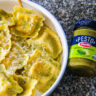 Barilla Creamy Genovese Pesto next to loster ravioli